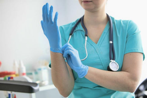 Medical professional wearing ValiantShield nitrile gloves