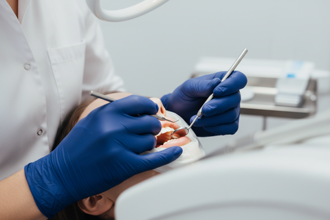 Dentist wearing ValiantShield nitrile gloves